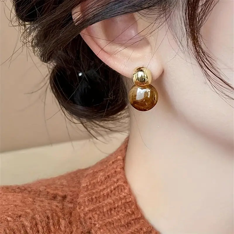 Pendientes colgantes Aurélie Ámbar | Oro