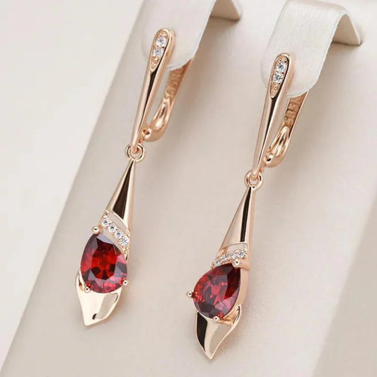 Exquisito colgante con pendientes de cristal rojo | Dorado