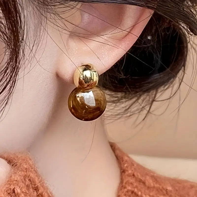 Pendientes colgantes Aurélie Ámbar | Oro