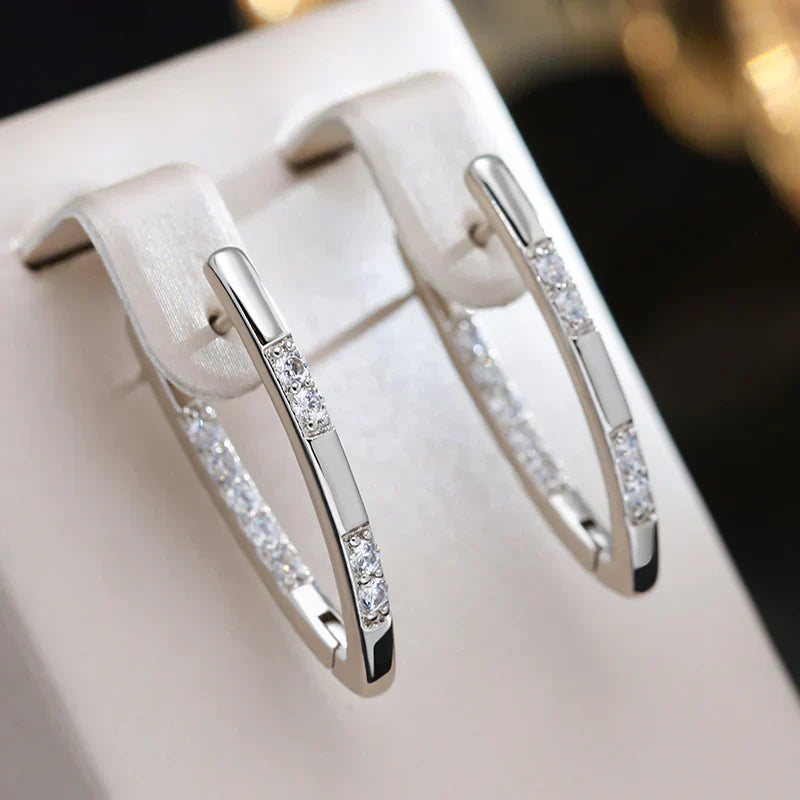 Exquisitos pendientes de circonita | Oro blanco