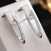 Exquisitos pendientes de circonita | Oro blanco